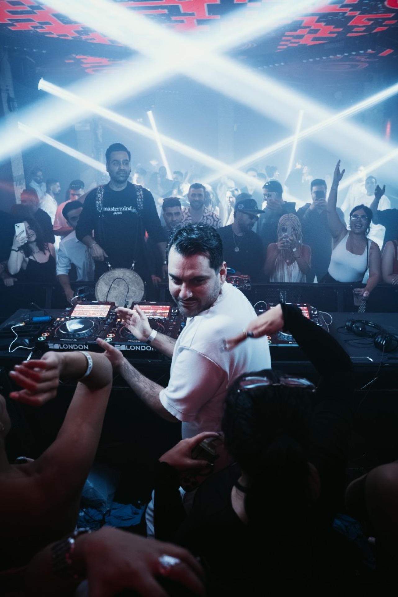 Portrait DJ at London decks — Iranian DJ bookings in the United Kingdom